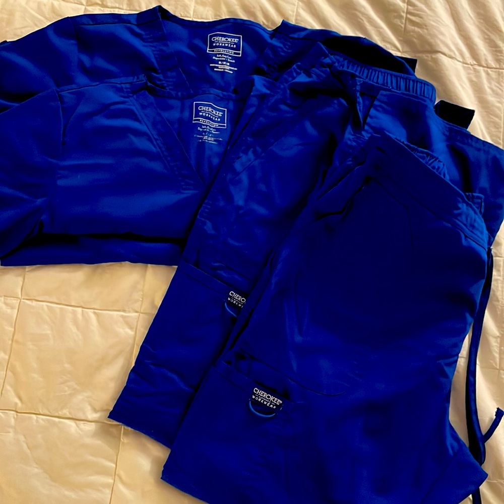 2 sets of blue Medium Cherokee workwear good condition wide leg.Selling all